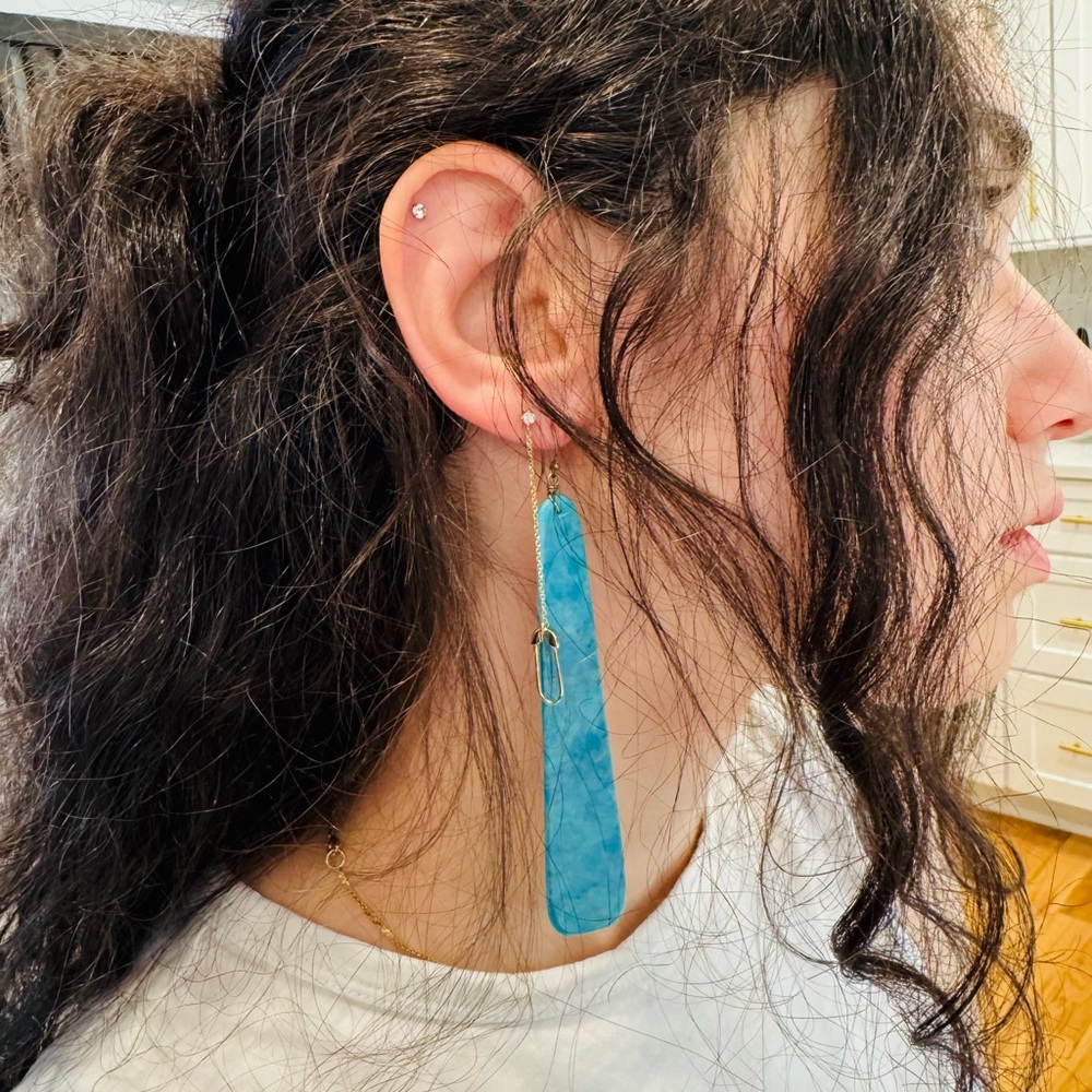 Turquoise composite slab earrings.